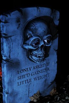 a blue tombstone with a skull on it's face and the words, i only asked if shedd ganeda little weight