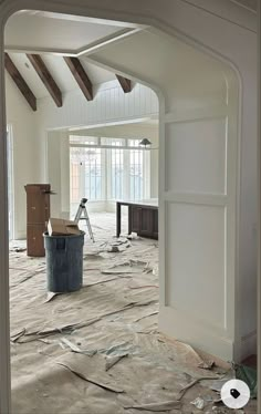 a room that is being remodeled with some paint on the floor