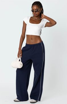 These Edikted Autumn sweatpants are the ultimate choice for a cozy, effortless look. Perfect for lounging or running errands, their relaxed fit ensures you'll feel stylish and comfortable all day long.SweatpantsRelaxed fitElastic stretch waistbandCotton, PolyesterModel wears size SModel height is 5'7Item care: Wash with similar color Edikted Womens Autumn Sweatpants - Blue size XS Sweatpant Outfits Streetwear, Sweatpants Photoshoot Ideas, Nike Track Pants Outfits, Bell Bottom Sweatpants, Relaxing Clothes, Blue Sweatpants Outfit, Teenager Outfits For School, Long Sweatpants