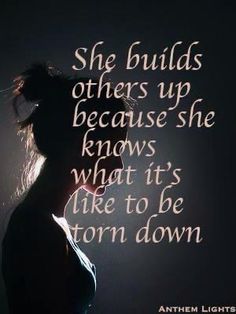 a woman's silhouette with the words she build others up because she knows what it's like to be torn down