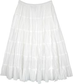 A bright milky white tiered midi skirt in cotton that keeps you comfy and cool this season.  This charming white skirt has 6 panels and quite some flare. #tlb #Crinkle #TieredSkirt #FairycoreSkirt #TieredSkirt #PixieSkirt White Tiered Skirt With Gathered Details, White Ruffled Flared Maxi Skirt, White Ruffled Full Maxi Skirt, White Flowy Tiered Maxi Skirt, White Tiered Gathered Maxi Skirt, White Cotton Gathered Maxi Skirt, White Cotton Maxi Skirt With Gathered Detail, White Tiered Cotton Skirt, White Cotton Voluminous Maxi Skirt