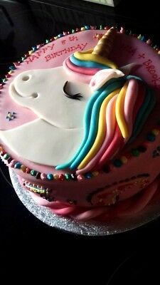 there is a cake that has a unicorn on it