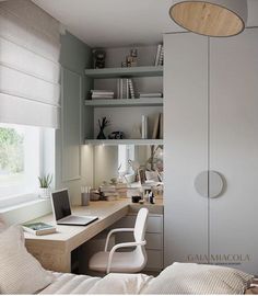 a bedroom with a bed, desk and chair in front of a book shelf filled with books