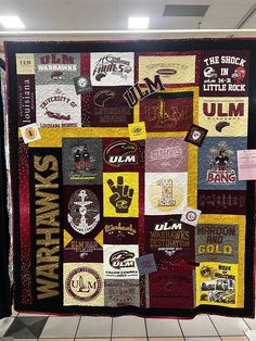 a quilt made to look like it has many different logos on it