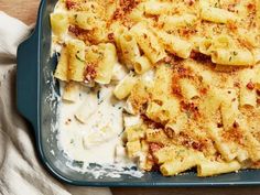 a casserole dish filled with macaroni and cheese