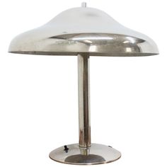 a metal table lamp on a white background