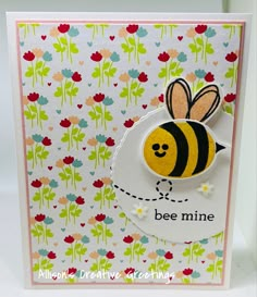 a card with a bee on it and the words bee mine written in black ink