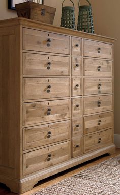 a large wooden dresser sitting on top of a rug