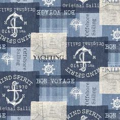 a blue and white patchwork fabric with an anchor, ship wheel, anchors and other words on it