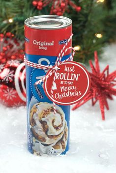 a can of rollin's merry christmas cookies in the snow