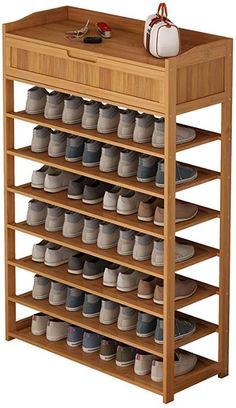 a wooden shoe rack with many pairs of shoes on the top and bottom shelves below