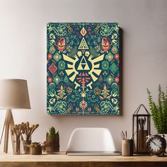 the legend of zelda poster is hanging on a wall above a desk with lamp and plants