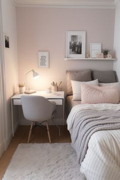 a bedroom with a bed, desk and pictures on the wall