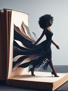 a woman in a black dress is walking through an open book