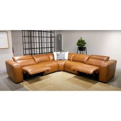 a tan leather sectional sofa in an office