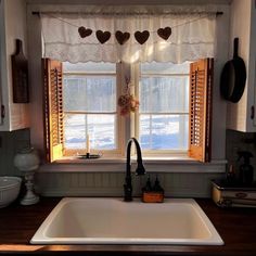 the kitchen sink is clean and ready for us to use