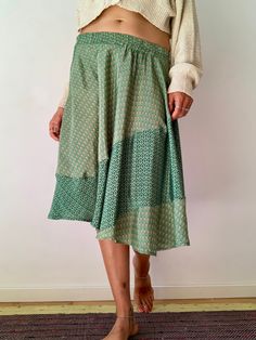 This is gorgeous maxi skirt easy and comfy  free flowing while you move, feels light and comfortable for daily wear round the city or the beach  MEAESURE elasticated waist 28-32" length 35" MATERIAL *blended silk  *no lining Please visit also  https://www.etsy.com/uk/shop/Gyaki For more boho style ideas CARE INSTRUCTIONS  * Wash in warm water * Hand wash recommended * Hang to dry  IMPORTANT NOTE  * This skirt price was reduced due to tine mark at the back. If you have any doubts please contact u Knee-length Bohemian Relaxed Skirt, Beach Midi-length Gathered Skirt, Bohemian Midi-length Flowy Maxi Skirt, Bohemian Ankle-length Cotton Skirt, Non-stretch Floral Print Beach Skirt, Boho Skirts, Casual Skirt, Circle Skirt, Dress With Cardigan