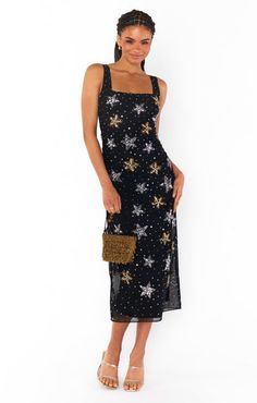 The Stassi Starfish Midi Dress Black is a dazzling number that's perfect for making a statement. This figure-flaunting midi is covered in shimmering beaded starfish sequins, sure to catch the light and turn heads wherever you go. The all-over beaded... Beaded Starfish, Boss Brand, Flowing Dresses, Swim Fashion, Basic Tops, The Girl Who, Fitted Bodice, Black Midi Dress, Denim Shop