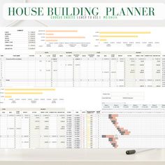 the house building planner is displayed on a table