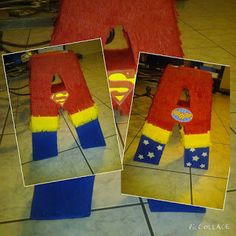 the letters are made out of felt and have superman's capes on them