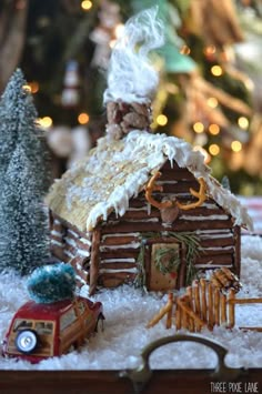 an image of a christmas scene with a gingerbread house