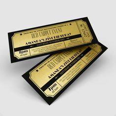 two black and gold ticket style tickets