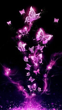 purple butterflies are flying in the air with sparkles and glittery dust around them