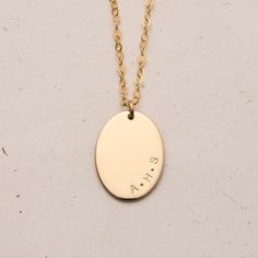 DESCRIPTION Minimalism arrives in its finest form with the Sage Pendant - an elegantly off-centre necklace with your choice of initials, a word or the name of a loved one. Crafted with love in our sunny Brisbane studio, each KBN piece is hand cut, stamped, drilled, polished and assembled by our small team. As we create our jewellery by hand, there will always be variation in alignment and spacing. The beauty of this process is that each Kellective piece is unique to its wearer. Important - we ha June Birthday, Oval Necklace, Personalised Jewellery, Gift Vouchers, Rose Gold Necklace, Bar Necklace, A Word, Brisbane, Anklets