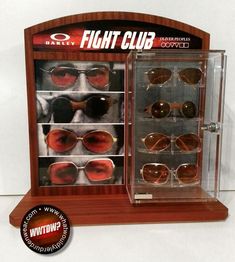 a display case with many pairs of sunglasses in it