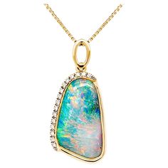 Extremely romantic and glamorous, ‘Madame Butterfly’ opal pendant features an attractive and versatile boulder opal (6.65ct) sourced from Winton mines in Queensland, Australia, bound to turn heads by its sheer beauty. Masterfully crafted in our gorgeous 18K yellow gold, the timelessly elegant boulder opal’s play-of-colour featuring subtle hues of pink, orange and blue is entirely magnificent. This pendant is a perfect addition to your jewellery collection or would make a graceful gift for that s Opal Necklace Goddy, Moliva Diamond Opal Jewelry, Luxury Formal Opal Necklaces, Black Opal Jewelry, Faberge Jewelry, Metal Jewelry Making, Boulder Opal Ring, Madame Butterfly, Boulder Opal Pendant