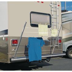 an rv with clothes hanging out to dry