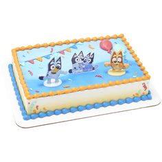 a birthday cake with cartoon characters on it