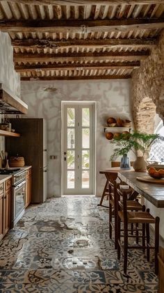 a kitchen with an old fashioned tile floor