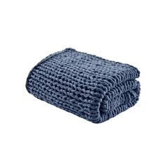 two blue hand towels folded on top of each other in front of a white background