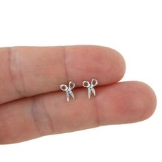 A simple pair of tiny scissor earrings in sterling silver.  The earrings measure 7mm x 6mm. These earrings are great for those with sensitive ears. This listing is for one pair (2 pieces). Earrings will ship in a gift box Barber Gifts, Cosmetologist Gifts, Hair Dresser, Jewelry Earrings Studs, Diy Jewelry, Favorite Jewelry, Wedding Gifts, Jewelry Earrings, Stud Earrings