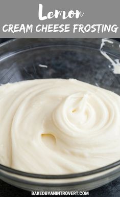 a glass bowl filled with cream cheese frosting