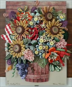 a wooden basket filled with lots of colorful flowers