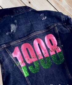 This custom designed inspired Alpha Kappa Alpha Jacket is an iconic show stopper. This denim style jacket is durable, thick and comfortable. Please keep in mind that ALL items are CUSTOM MADE TO ORDER. Please allow 7-10 business day for production and shipping. As always, thanks sew much for supporting my business.  *100% Denim *Machine Washable *Regular Fit *All orders are CUSTOM created *Hooded *Button Up Fitted Fall Denim Jacket With Letter Print, Trendy Denim Jacket For Fall Customization, Trendy Customizable Outerwear For Spring, Alpha Kappa Alpha Jackets, Alpha Kappa Alpha Clothing, Aka Sorority, Custom Denim, Sorority Life, Alpha Kappa Alpha