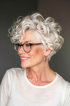 Grey Curly Short Hair, Silver Hair Face Claim, Short Curly Grey Hairstyles For Women, Short Blonde Curly Hair Natural Wavy Bobs, White Hair Pixie Cut, Menopausal Hair Styles, Short Curly Hair With Glasses, Short Curly Gray Hair Over 50 Curls, Blond Curly Bob