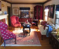 a living room filled with furniture and a fire place