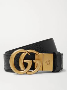 Inspired by hardware from the '70s, Gucci's highly recongnisable 'double G' emblem was one of Mr Alessandro Michele's first contributions as the house's Creative Director in 2016. This Italian-made full-grain leather belt features the logo in the form of a patinated gold-tone buckle. Small to size. See Size & Fit notes. Luxury Gucci Belts, Gucci Collection, Belt For Men, Gucci Logo, Leather Belts Men, Alessandro Michele, Mens Style, Gucci Accessories, Leather Belts