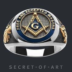 a ring with an masonic symbol on it