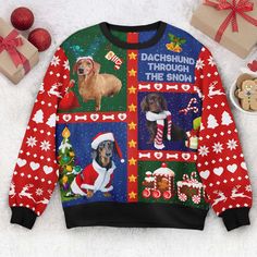 the dachshund through the snow ugly ugly christmas sweater is on display next to presents