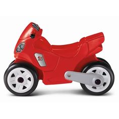 a red toy motorcycle with white wheels