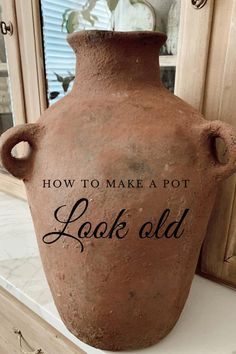 an old brown vase with the words how to make a pot look old on it