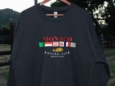 Classic sweatshirt with ribbed crew neck and soft fleece inside. Features a fully embroidered Monaco Racing Club design on the front. * 100% cotton face * 65% cotton, 35% polyester fleece inside * Double-needle stitched rib collar, cuffs, and hem WE RECOMMEND: * Order one size up for a more relaxed fit * Machine wash cold and hang dry or tumble dry with low heat Made to order. Designed by racers and motorsports enthusiasts in Laguna Beach, California.  Please reach out to us if you have any issu Mercedes Merch, Ferrari Sweatshirt, Monaco Sweatshirt, F1 Clothing, Vintage Monaco, Car Sweatshirt, Car Clothing, Racing Hoodie, Race Day Outfits