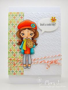 a close up of a card with a girl holding a cookie and an empty thought bubble