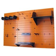 a pegboard with shelves and hooks on it