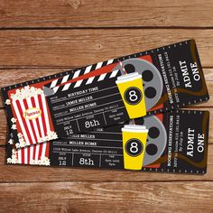 two movie tickets with popcorn and drinks on them