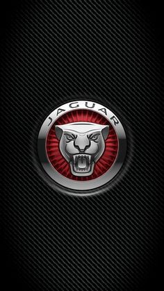 the jaguar logo on a black background with red and silver accents is seen in this image